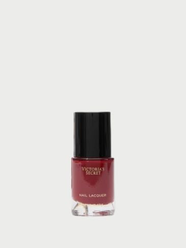 Victoria's Secret burgundy nail polish on a light grey background