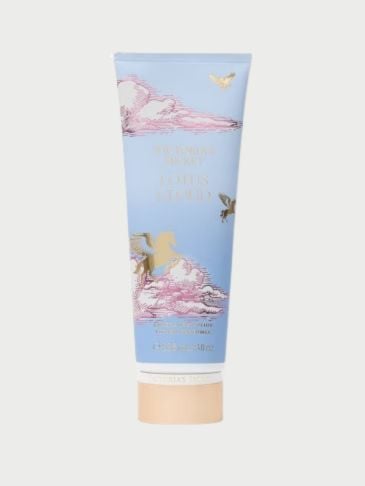 Victoria's Secret skyblue tube of Parfumed lotion on light grey background