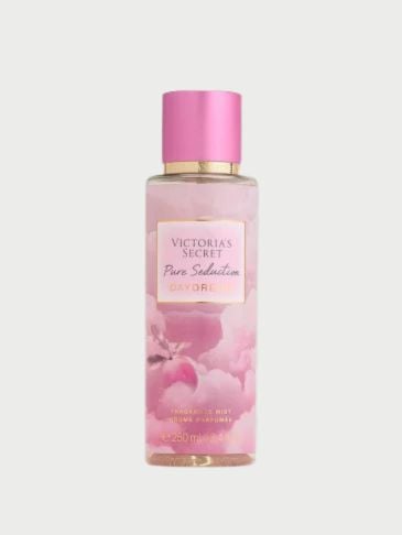 Victoria's Secret pink bottle of Perfumed lotion on a light grey background